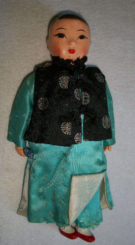 A vintage doll ( Bisque?)