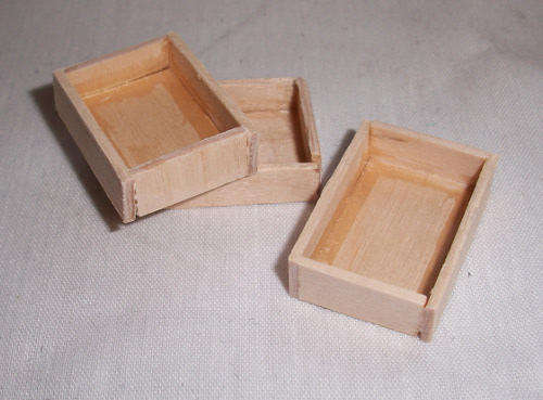 Miniature wooden crates, plain pine.