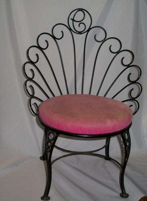 Wrought iron child chair.