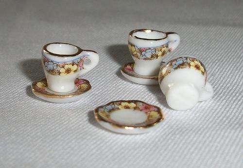 Dollhouse china teacup and saucer