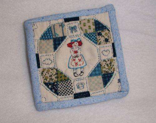 Miniature hand crafted quilt.