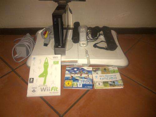 wii console with wii fit board and resort