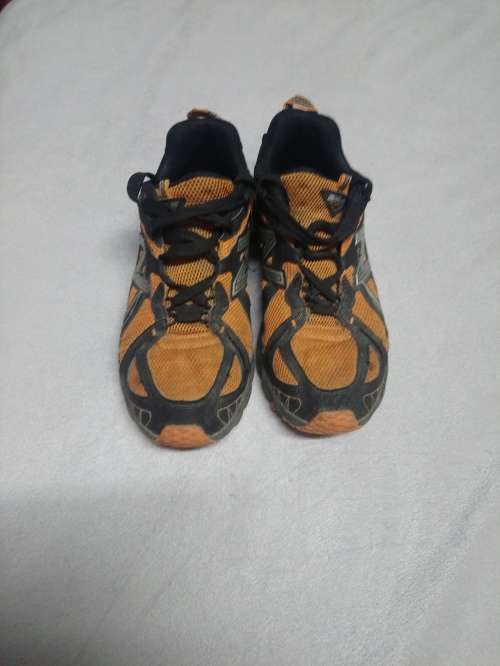 Orange/Black New Balance size 9