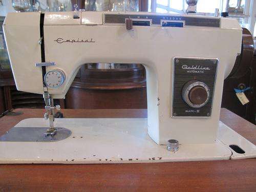 Vintage EMPISAL Sewing machine in Cabinet