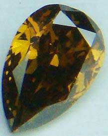 WARM COGNAC!!- 0.26CT PEAR DIAMOND