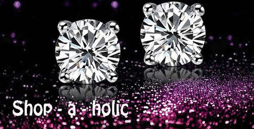 ***STUNNING CRYSTAL FOUR CLAW STUD ***