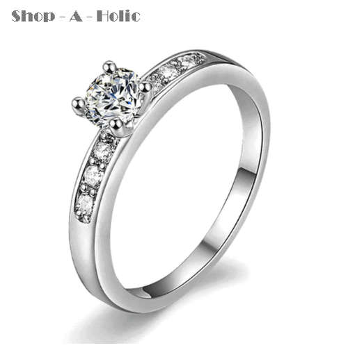 *** STUNNING SIM DIAMOND 4 CLAW 18K WHITE GP ENG RING * Size 9  ***