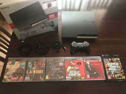 Sony PS3 320Gb with DualShock controller and 6 games