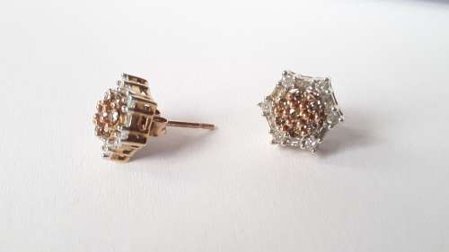 9ct gold champagne diamond studs with diamond halo. Wear in 2 ways