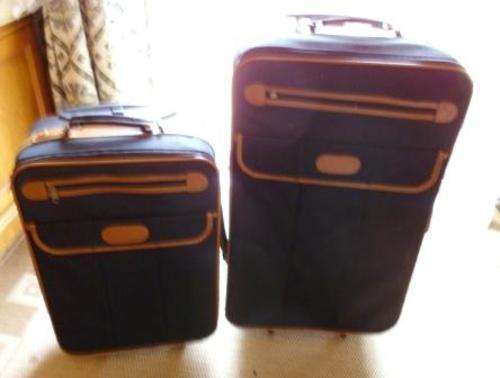Black and Tan Two Wheel Suitcases