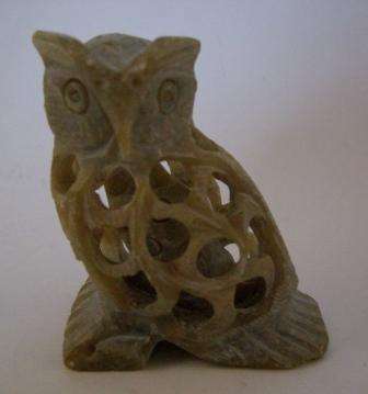 Stone Carved Owl with Smaller Owl Inside