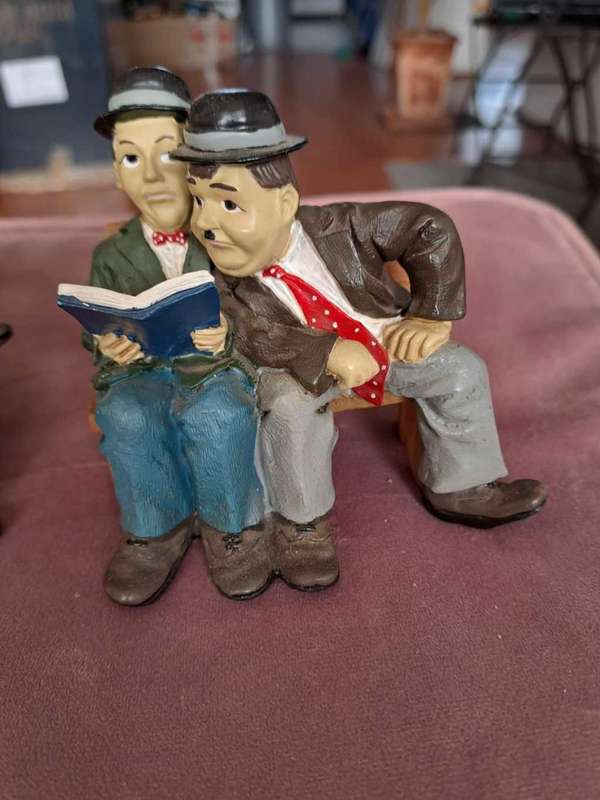 2 x Laurel and Hardy figurines, Reading and Sleeping