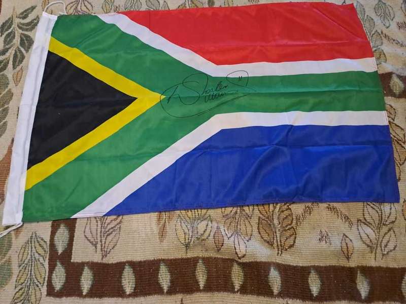 Chester Williams original signature on SA Flag