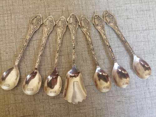 1838 Voortrekker Eeufees teaspoons and sugar spoon