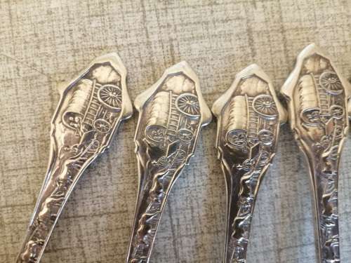 1838 Voortrekker Eeufees teaspoons and sugar spoon