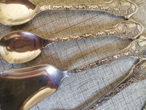 1838 Voortrekker Eeufees teaspoons and sugar spoon
