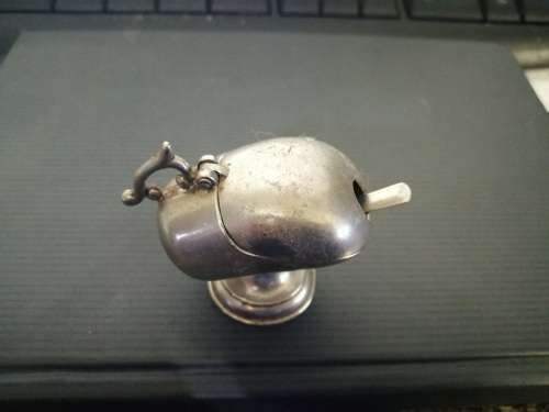 Salt server in the shape of a miniature sugar bowl