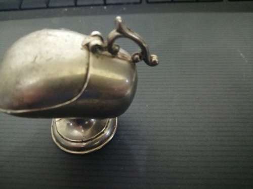 Salt server in the shape of a miniature sugar bowl
