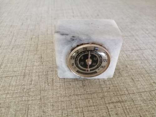 Thermometer set in marble