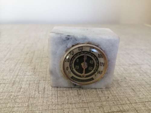 Thermometer set in marble