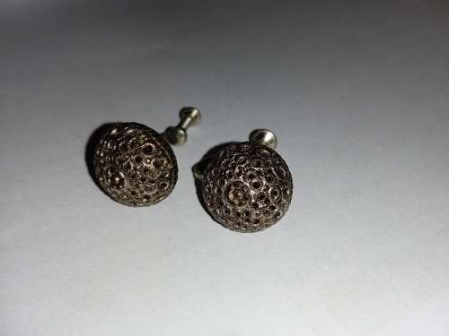 Pierced design earrings