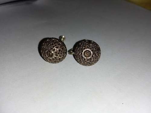 Pierced design earrings