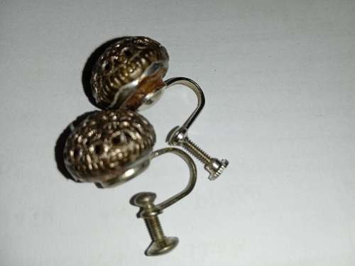 Pierced design earrings