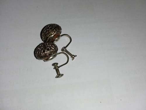 Pierced design earrings