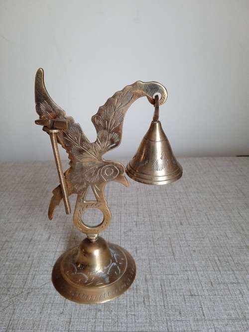 Stunning brass dinner bell