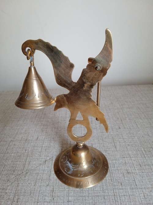 Stunning brass dinner bell