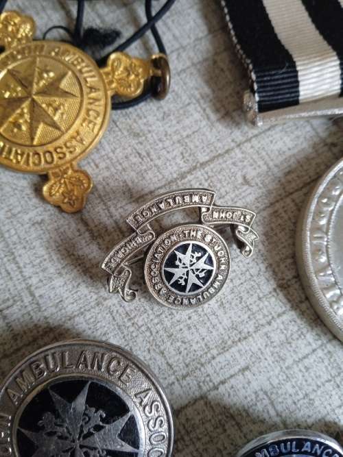 St Johns Victoria Brit long service medal and some st Johns badges and pins
