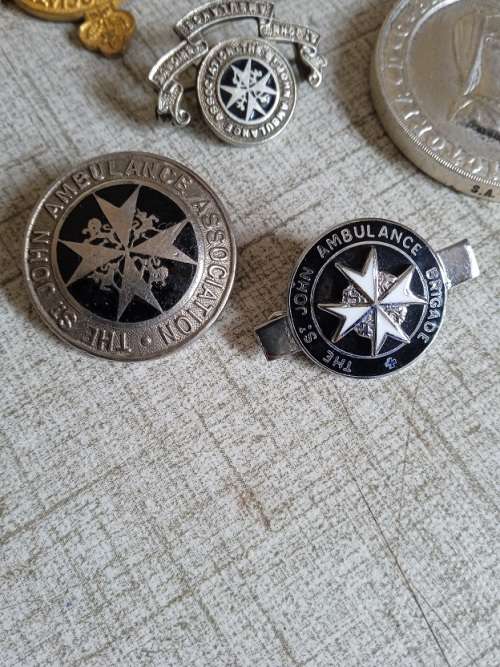 St Johns Victoria Brit long service medal and some st Johns badges and pins
