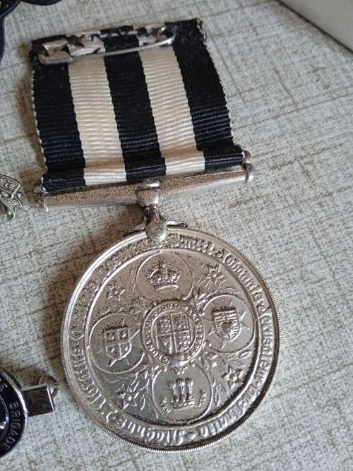St Johns Victoria Brit long service medal and some st Johns badges and pins