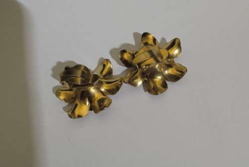 Gold toned flower clipon earrings