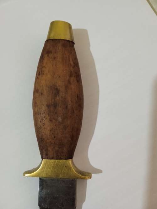 Dagger with brass and wood handle