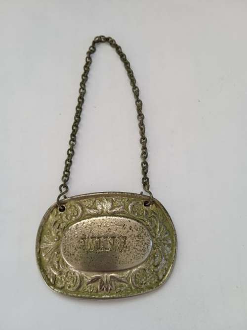 Antique silver plated wine label