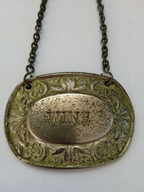 Antique silver plated wine label
