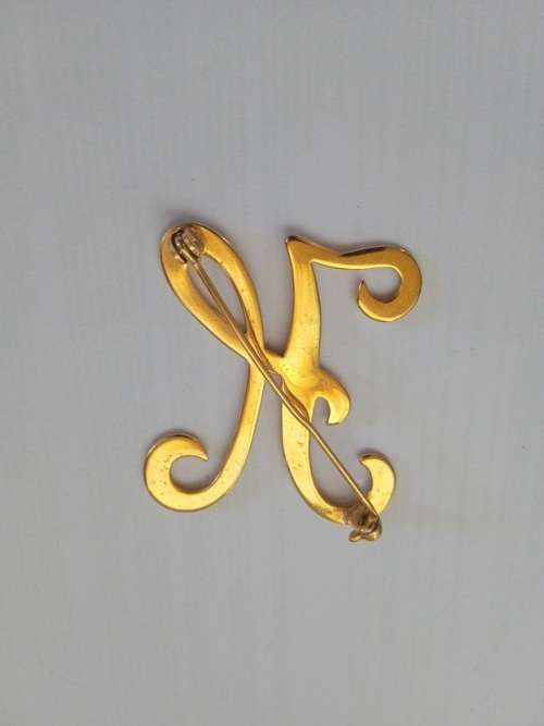 Letter brooch