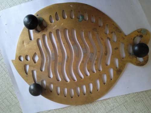 Brass trivet in the shape of a fish