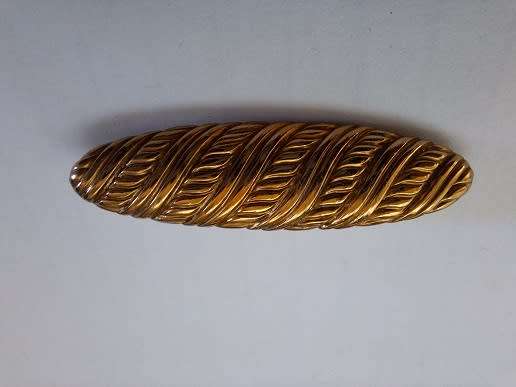 Gold toned elegant brooch