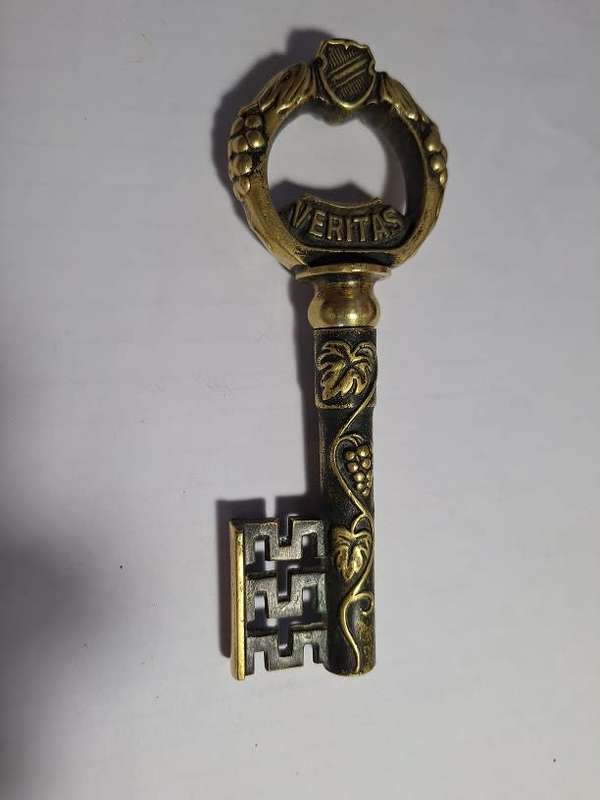 Vintage brass In Vino Veritas key cork screw
