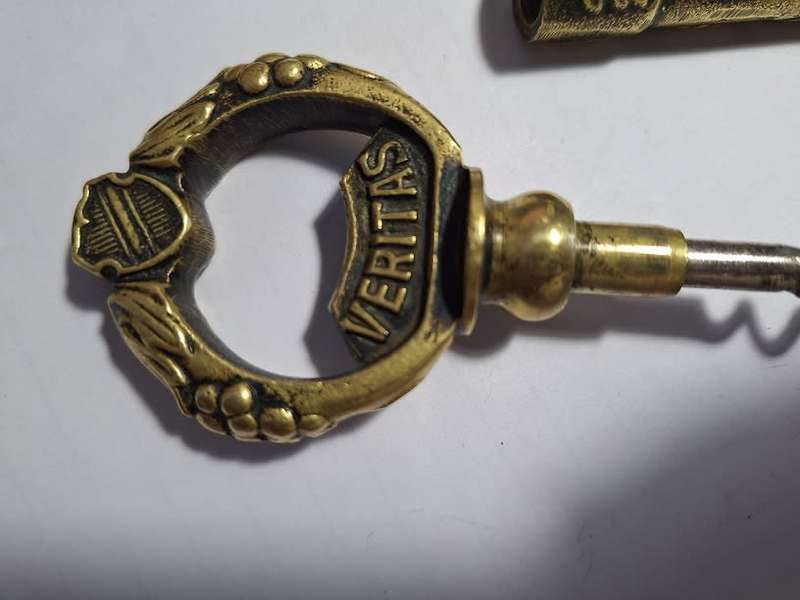 Vintage brass In Vino Veritas key cork screw