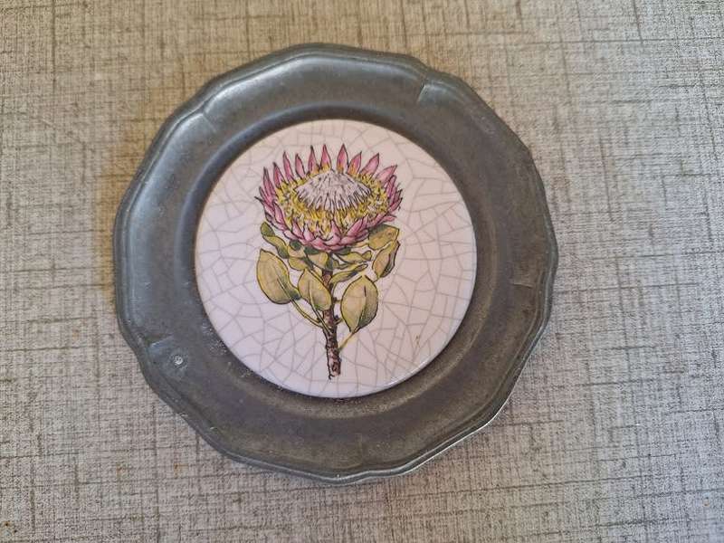 Small pewter???? and tile wall plate
