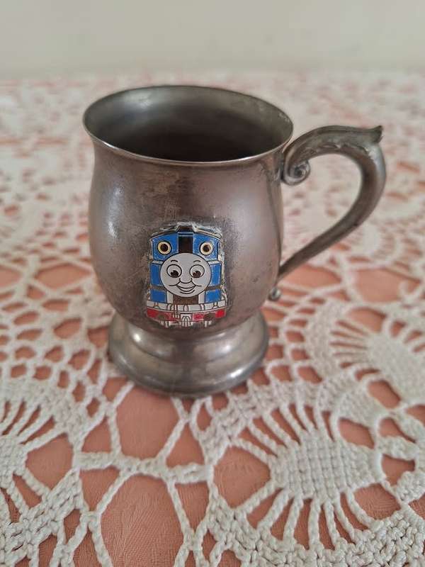 Small silver plated mug with Thomas Tank emblem 7.5cm high