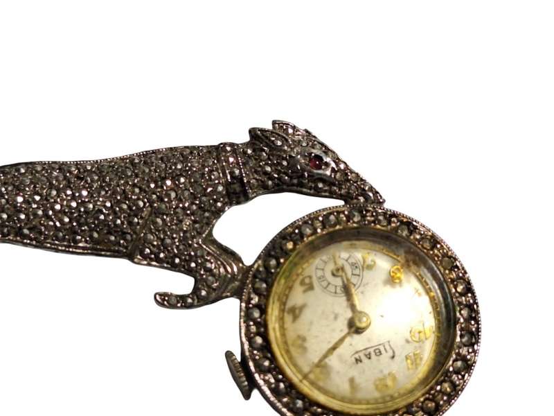 Vintage sterling silver and marcasite brooch with watch (not working)