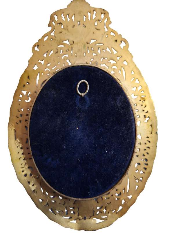 Absolutely stunning pictures behind convex glass surrounded by ornate frame