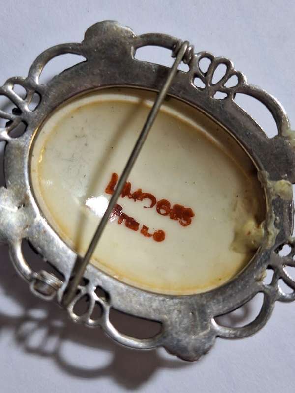 Limoges brooch in silver?? surrounds