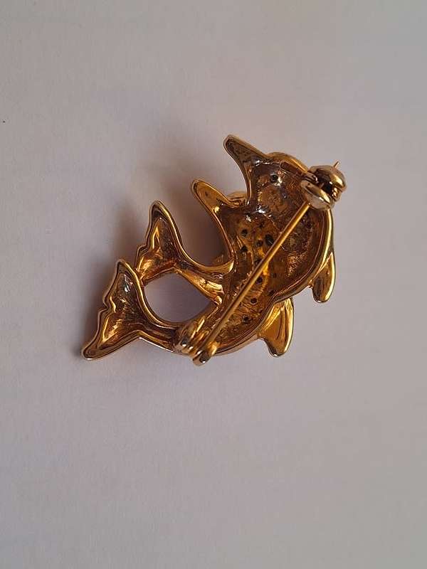 Dolphin brooch
