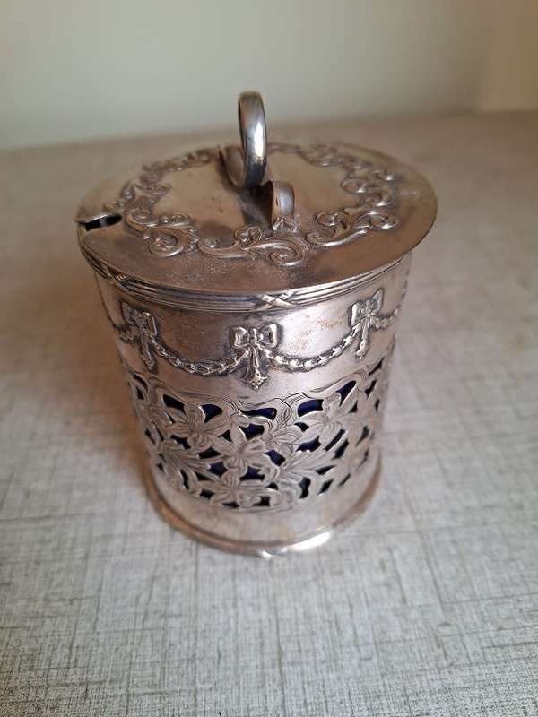 Stunning silver plated jar with blue glass liner