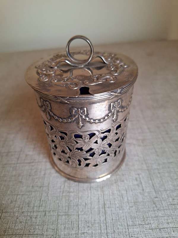 Stunning silver plated jar with blue glass liner